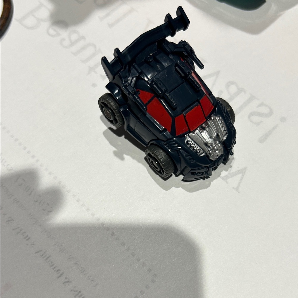 2011 Black and Red Transformer Toy Car